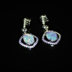 White opal diamond cut studs